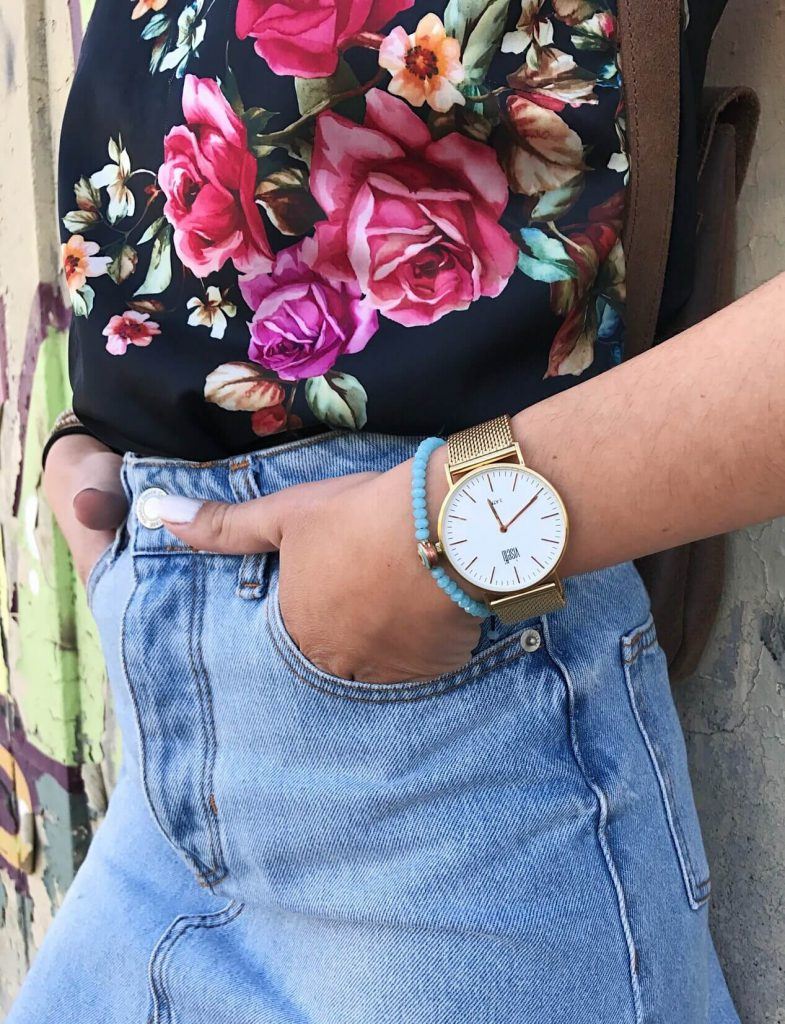 Gold Watch with denim skirt