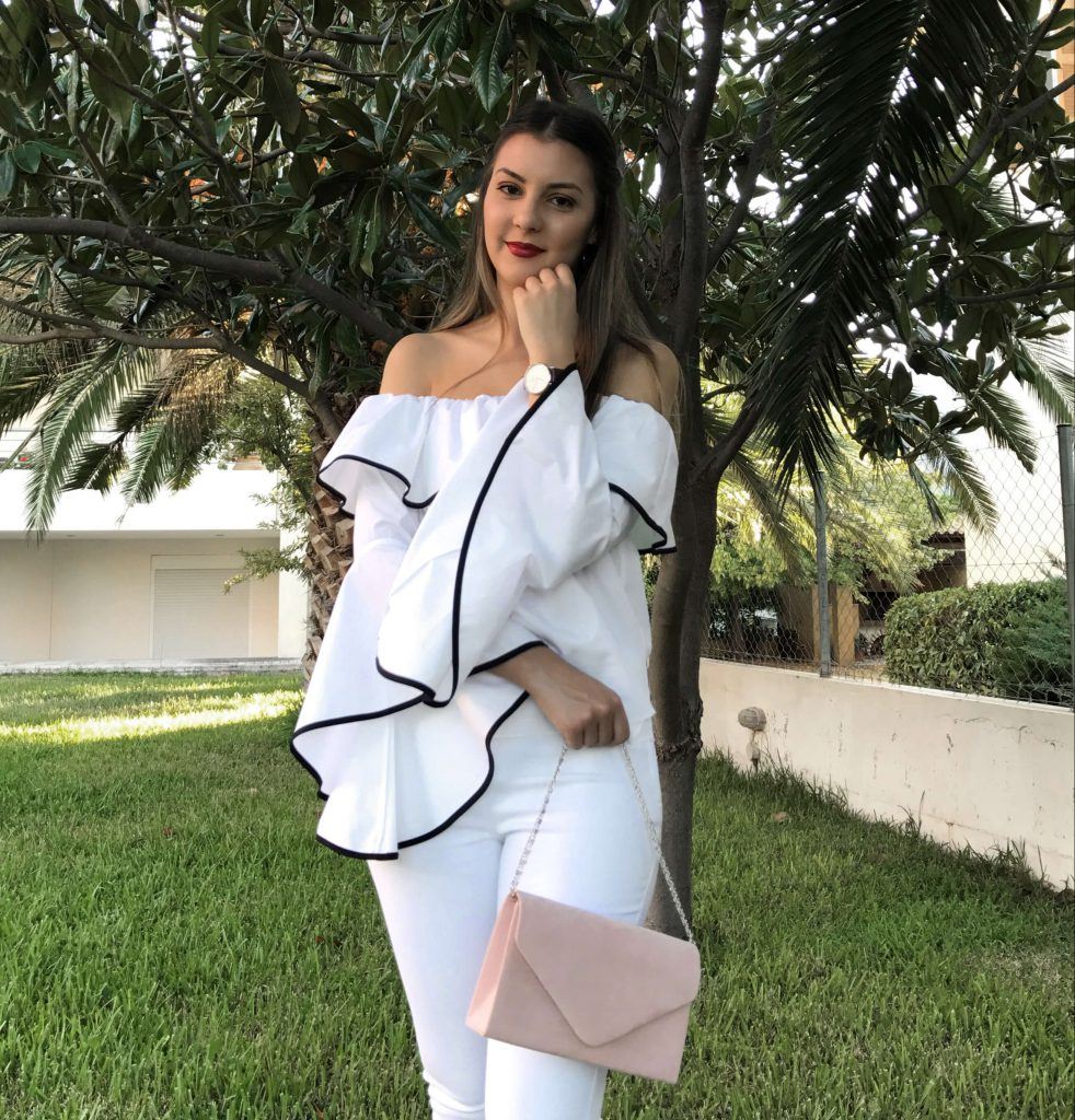 total white outfit with a touch of pink